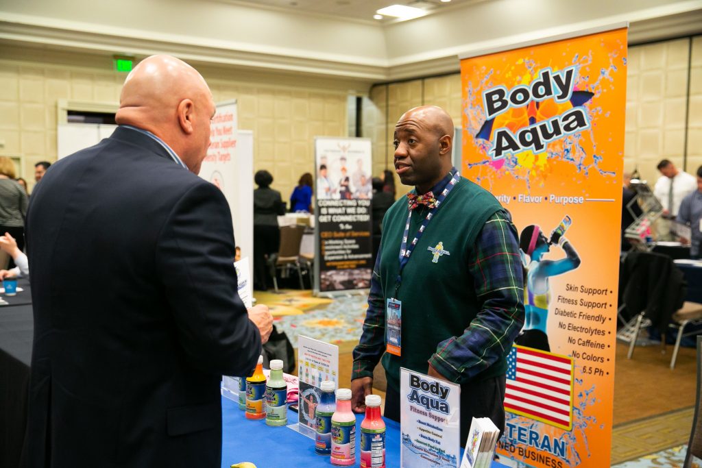  Sherman Williams showing off his product Body Aqua at IVMF's EDGE conference.